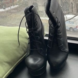 Used Lace-up platform black booties. Size 8